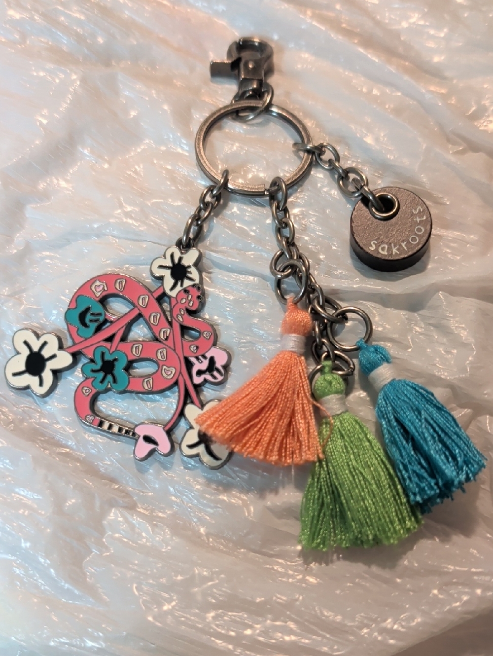 Sakroots Pink Floral Snake Keychain with Orange, Green & Blue Tassels